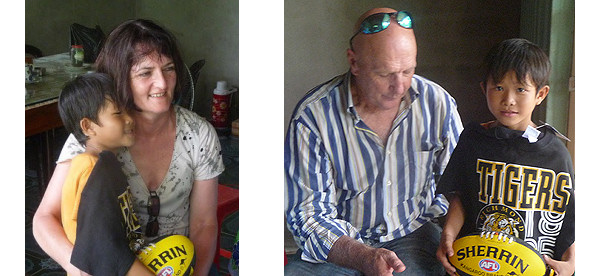 Barb with NGUYEN Y NHAT complete with Richmond Football Jumper and Football