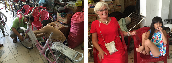 Assembling the ten bikes, with Sue and her new best friend watching
