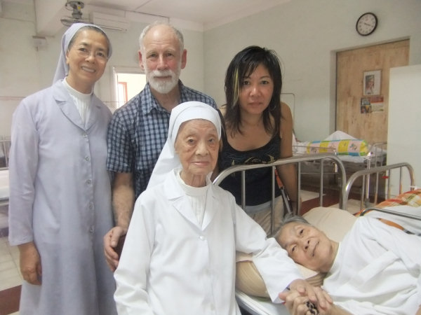 The Nun in the bed is Sister Melanie, 100+, who was also involved in the amazing adoption process of Marie (sadly she passed away in November 2012).