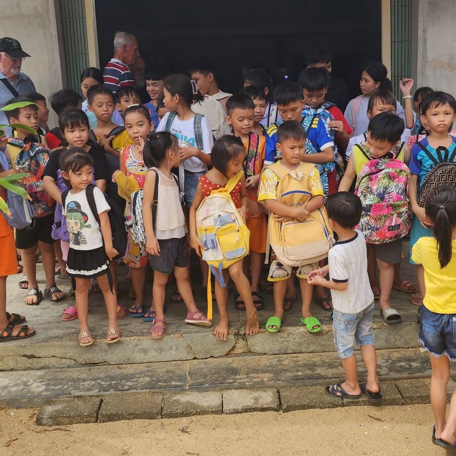 Happy children with their back packs