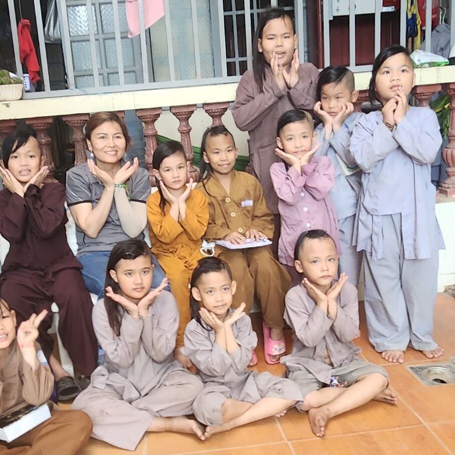 Suong enjoying some children at Tu An